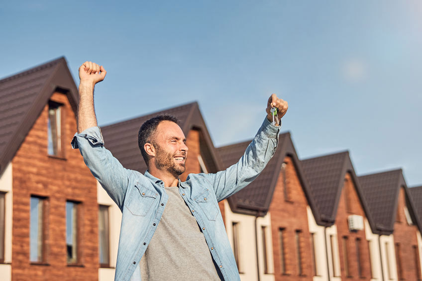 happy man with arms in the air