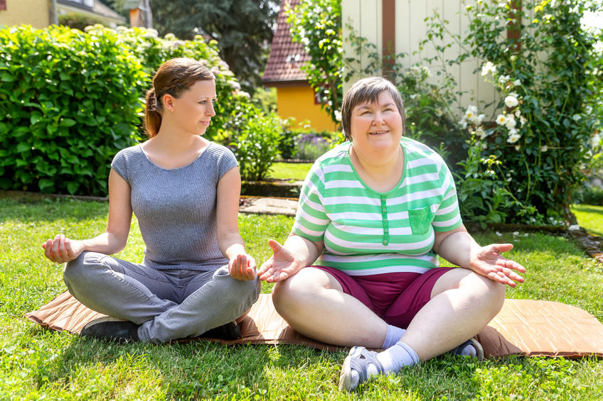 two women meditating